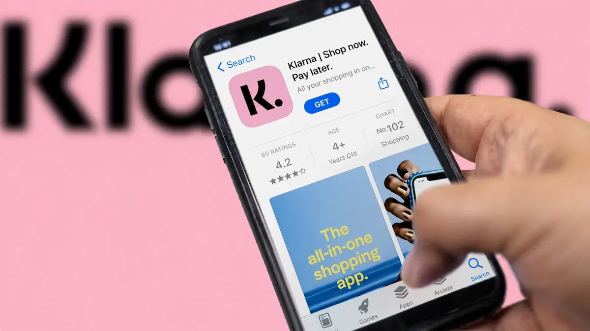 Klarna app on a phone — Shop now. Pay later.